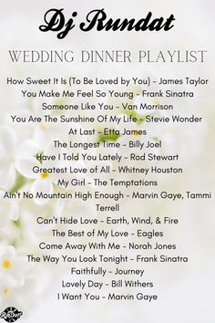 the wedding dinner playlist with white flowers