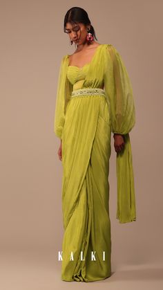 Step into a world of enchantment with our mustard yellow saree set in crepe. The blouse is a true showstopper with its organza bishop sleeves and sweetheart neckline. Completing the set is a captivating belt adorned with delicate resham thread work and cutdana handwork. EVENT - Perfect for cocktail parties festive celebrations and special occasions. Plazo Saree Style, Lime Green Saree, Harmony Tattoo, Chaniya Choli Designs, Chiffon Sarees, Happy Dresses