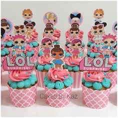 cupcakes decorated with pink and blue frosting