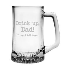 a glass mug that says drink up, dad