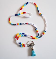 Features- Acrylic beads Silver hardware Matching Tassel Breakaway Clasp With each lanyard sold, proceeds will be donated to Autism Speaks 🤍❤️💛💙 Personalized Lanyards, Lanyard Id Holder, Lanyard Teacher, Teacher Lanyard, Badge Holder, Id Holder, Badge Holders Lanyard, Acrylic Beads, Badge Holders