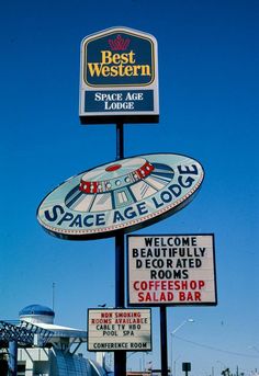 a sign for the best western space age restaurant