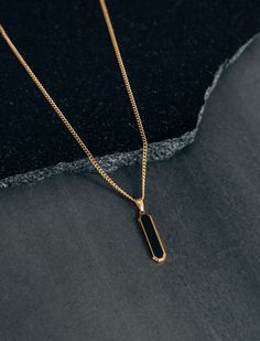 Be stylish, bold, and confident with this stainless steel drop pendant necklace. It is both masculine and durable and will maintain its sleek appearance for a long time when handled with care, it is perfect for everyday wear and is safe for your sensitive skin. 💎Free shipping on all orders💎Packaging that is ready to offer as a gift💎Customizable chain length The black drop pendant necklace, a perfect gift or stylish piece for yourself Indulge your loved ones with this timeless and elegant drop pendant necklace, designed to add a touch of sophistication to any man or woman's wardrobe. A perfect gift for those who appreciate classic and bold style! A stylish, durable and timeless pendant necklace Because it is made of stainless steel, it is going to last over the years and it is designed f Men In Necklaces, Mens Sapphire Necklace, Masculine Jewelry Gold, Gold Chains For Men With Pendant, Mens Gold Jewelry Necklace, Men Simple Jewelry, Men’s Gold Pendant, Necklace Men’s Gold, Men’s Jewelry Aesthetic