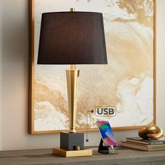 Inspired by Art Deco styling, the Wayne brass metal and black marble table lamp is a classic upgrade for any living room decor. From the Possini Euro Design brand, this design features a combination of brass and black finishes on its metal construction and marble base. A black tapered drum lamp shade completes the iconic look, and two USB ports on the base allow for easy charging of smart phones and other devices. Size: 28 x 14 x 14.  Color: Gold. Luxury End Table, Lamps With Usb Ports, Lamps Nightstand, Black Marble Table, End Table Lamp, Colorful Table Lamp, Bedroom Lamps Nightstand, Single Living, Elegant Table Lamp