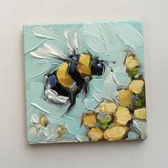 a painting of a bee on a blue background