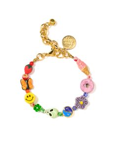 Our Rainbow Surprise Bracelet will add a pop of color to your outfit! This fun and vibrant piece is sure to brighten up any look with its colorful beads graduating from one rainbow hue to the next. 6" Beaded bracelet 1.5" extension Lobster clasp closure Gold plated brass hardware Ceramic charms Millefiori glass charms Handmade in New York City and Puerto Rico. Due to the handmade nature of our products, some charms may vary in color and style or be replaced if unavailable. Please allow 5-7 busin Ceramic Charms, Funky Bracelet, Nose Ring Jewelry, Dope Jewelry Accessories, Expensive Jewelry Luxury, Jewelry Accessories Ideas, Glass Charms, Dope Jewelry, Jewelry Fashion Trends