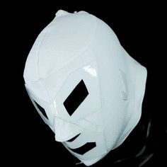 a white mask is shown against a black background