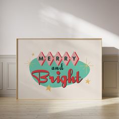 a merry and bright sign in a frame on the floor next to an empty wall