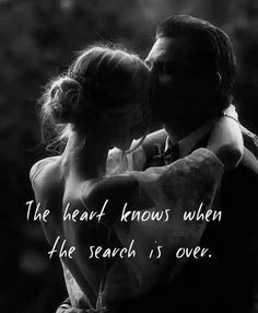 a man and woman embracing each other with the words, the heart knows when he search is over