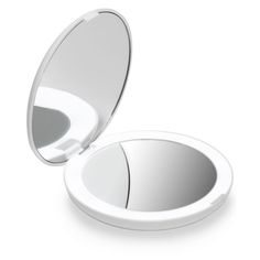 an empty compact mirror on a white background