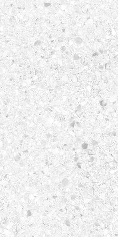 a white marble textured background with small dots