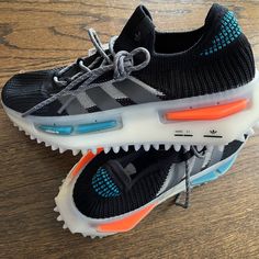 Adidas Nmd S1 Athletic Sneakers! Super Cool Colors And Style! Men’s Size 9. Wms 10?? New With Tags! Adidas Nmd S1, Adidas Urban Black Running Shoes, Adidas Nmd Men, Adidas Nmd S1 Black, Adidas Nmd Boys, Adidas Rivalry Low, Adidas Nmd R1 Black, Adidas Originals Ozweego, Adidas Originals Nmd R1