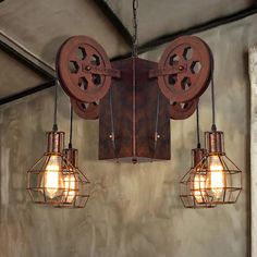 three light fixtures hanging from the ceiling