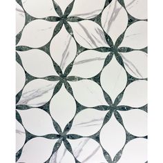 an artistic tile design in black and white