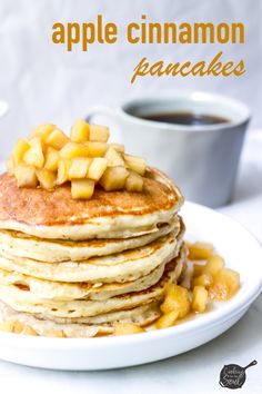 a stack of pancakes topped with sliced pineapple