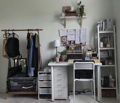 a white desk and chair in a room