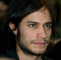 a close up of a person with long hair