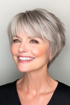 Save this pin for the best shag hairstyles for women over 60. If you’ve been tempted to try something short, this pixie is your answer. It’s short and sassy, with shaggy layers that give it texture and life. Older Women's Short Hairstyles, Short Shaggy Grey Hairstyles, Short Hairstyle Women Back View, Short Hairstyle Women Older, Grey Hair Inspiration Older Women, Short Shaggy Bob Haircuts, Woman Hairstyles Short, Short Haircuts For Women Over 60, Short Hair Styles Round Face