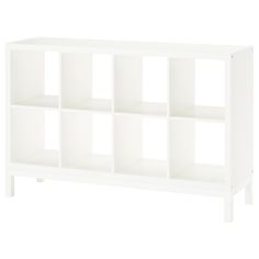 a white bookcase with six cubbys on the bottom and four shelves below