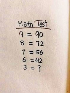 a piece of paper with the word math test written on it and numbers in different languages