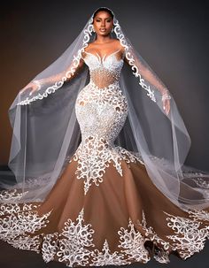 Elevate your bridal look with our stunning Luxury White Beaded Brown Colored Wedding Gown. Featuring intricate beadwork and a longer veil, this gown exudes elegance and charm, perfect for young girls and women ready to say "I do" in style. Veekee James, Brown Gown, Colored Wedding Gowns, Wedding Groomsmen Attire, White Lace Wedding Dress, White Wedding Gowns, Long Veil, Brown Wedding, Wedding Dresses Beaded