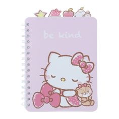 a notebook with hello kitty and teddy bear on it