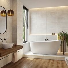 a large white bath tub sitting next to a sink in a bathroom under a window