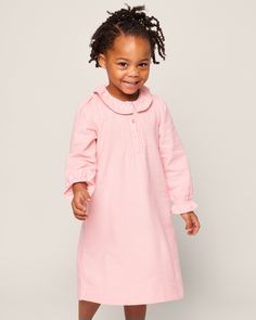 A feminine and sophisticated addition to our classic flannel colors. This fabric has unmatched softness and is lightweight, perfect for year-round comfort. The Victoria nightgown has stunning attention to detail with its intricately designed placket, and versatile collar. Petite Plume debuted the first-ever chemical-free, flame-retardant fabric for children's sleepwear. Fine yarn-dyed cotton is blended with a touch of inherently flame-retardant fiber to pass strict CPSC safety laws without relyi Victoria Nightgown, Flannel Nightgown Petite Plume, Kids Nightgowns, Baby Nightgown, Pink V-neck Nightgown, Casual Pink V-neck Nightgown, Girls Flannel, Pink Flannel, Kids Night