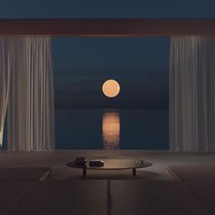 the moon is setting over the ocean with curtains