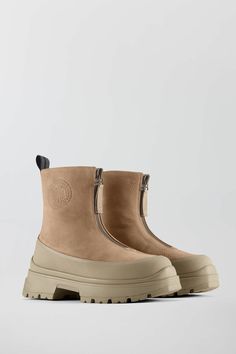 Crafted in ultra-luxe leather, the Kya Boot has a front zip closure for effortless wear in a sleek silhouette. With the same deep-tread sole as our Journey Boot and a rubber protective wrap, the Kya Boots are equally durable as they are versatile. Available in a palette of elevated neutrals, the Kya will become your go-to multi-season staple Elevated Neutrals, Journey Boots, Canada Goose Logo, Tan Ankle Boots, Footwear Design, Tan Woman, Hype Shoes, Leather Boot, Our Journey