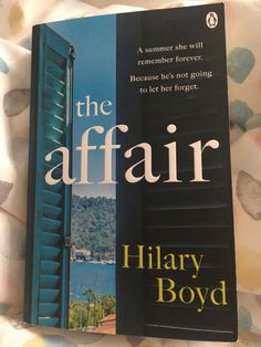 the book cover for the affair by hilar boyd is laying on a bed