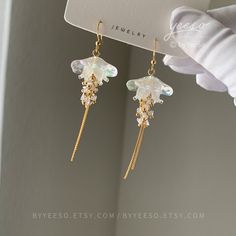 Jellyfish Dangle Earrings - Cute Lightweight Jellyfish drop Earrings - Unique Earrings - Beach vibes Earrings 🤍 Hypoallergenic 🌸 Handmade with love ✨ Cute & Dainty  🎁 Gift ready 〰️Click👇🏻 Find more Earrings🎀  https://www.etsy.com/shop/byYeeSo ◽️ PACKAGING ◽️  * The jewelry will be nicely packaged * Comes with a drawstring suede pouch * If you need personalized gift note, please click the link below, add it to your cart when check out to upgrade your packaging. https://www.etsy.com/listing/1008661207/upgrade-gift-packaging?ref=shop_home_active_1&frs=1 ◽️ SHIPPING ◽️ * USPS First Class Shipping Service with tracking number ◽️ CARE INSTRUCTIONS ◽️ * Avoid perfumes or sprays * Avoid getting your jewelry wet * Wipe down the jewelry to remove oils and prevent tarnish * Store jewelry in a c Jellyfish Earrings, Shrink Plastic Jewelry, Earrings Beach, Store Jewelry, Ocean Jewelry, Plastic Jewelry, Funky Jewelry, Earrings Cute, Earrings Unique