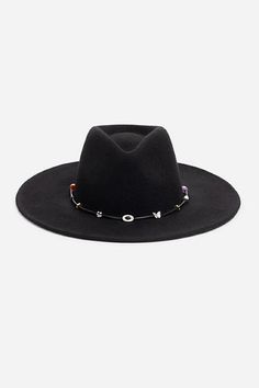 Crafted from 100% wool, the Beaded Hat is available in rich black. Featuring a mid-height crown and a wide, flat brim, this stunning hat is finished with a simple band accented with decorative beaded details. Pair with a fit-and-flare maxi dress and western style boots for a hint of bohemian style. Johnny Was Women's Beaded Hat in Black Elegant Black Hat With Flat Crown, Elegant Black Fedora With Flat Crown, Wool Flat Brim Party Hat, Wool Party Hat With Flat Brim, Party Wool Hat With Flat Brim, Adjustable Wool Party Hats, Elegant Black Beaded Hat, Evening Hats With Flat Brim For Fall, Flat Brim Evening Hats For Fall