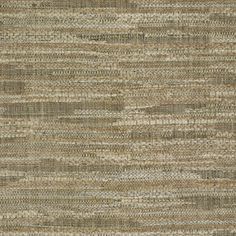 an up close view of the textured fabric in beige and brown tones, with small squares