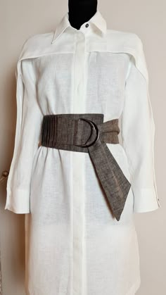 "OBI style wrap belt Wrap style Wide Obi Belt made from natural linen fabric. MORE COLOR AVAILABLE! DETAILS - comes in 10 sizes - Japanese style belt - 100% linen - natural flax color - Fabric: Linen,softened medium weight  SIZES - SIZE 1 - Waist 23\"-25\" = 58-63 cm - SIZE 2 - Waist 25\"-27\" = 64-69 cm - SIZE 3 - Waist 27\"-29\" = 69-74 cm - SIZE 4 - Waist 29\"-31\" = 74-79 cm - SIZE 5 - Waist 31\"-33\" =  79-84 cm - SIZE 6 - Waist 33\"-35\" =  84-89cm - SIZE 7 - Waist 35\"- 37\" = 89-93cm - SIZE 8 - Waist 37\"-39\" = 94-99cm - SIZE 9 - Waist 39\"-41\" = 99-104cm - SIZE 10 - Waist 41\"-43\" = 104-109cm If you need custom Size, please ask me ;)  FABRICS & CARE We use Oeko-Tex certified 100% European linen fabrics which guarantees you that it meets human - ecological requirements. The fabr Fabric Belt Design, Elegant Fabric Belt For Summer, Elegant Summer Fabric Belt, Elegant Beige Fabric Belt, Elegant Beige Belt, Elegant Summer Corset Belt With Belt Included, Elegant Fitted Brown Corset Belt, Elegant Summer Corset Belt, Fabric Belts For Women