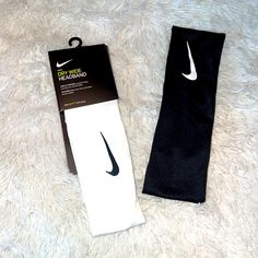 the nike dri - fit headbands are black and white