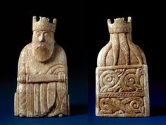 an image of two ancient vases that are in the shape of king and queen