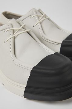 White non-dyed leather women's shoes with removable toe caps, OrthoLite® Recycled™ removable footbeds, and rubber outsoles (40% natural, 23% recycled).Made with minimal components and glue, Junction is easy to disassemble promoting a more circular approach to shoe-making. Leather Shoes For Women, Minimal Shoes, Camper Shoes, Ballerina Shoes Flats, Old Shoes, Shoes Heels Wedges, Leather Shoes Woman, Boots And Sneakers, Formal Shoes