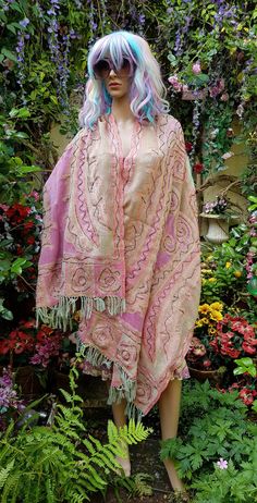 "Lovely vintage 1990s large wool scarf/shawl with a fabulous paisley, abstract and floral design in gorgeous different shades of pinks, pale pistachio green, orange and cream. This came from a high end boutique in Singapore in the mid 1990s. Gorgeous beadwork in black and embroidery in metallic gold thread throughout the shawl.  This piece is all hand embroidered and beaded. The shawl is warm and luxurious.  It is quite heavy due to the quantity of beads and the quality of the wool. Perfect for keeping the chill out on Spring or Autumn days or for Summer evenings. The two shorter sides of the shawl have wool tassels at the border.  A lovely retro piece. Looks gorgeous over a dress, by day or in the evening.  Very Glamerous ♥️♥️ Materials: The shawl is made from pure high quality wool. Ador Couture, Vintage Shawl, Vintage Shawls, Chiffon Shawl, Green Paisley, Different Shades Of Pink, Pistachio Green, Black Scarf, Pashmina Shawl