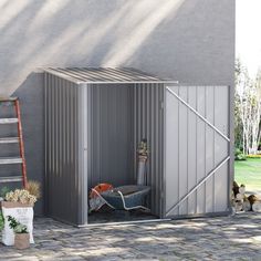 an outdoor storage shed with the door open