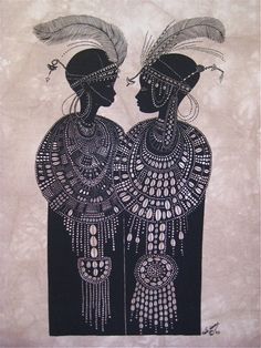 two african women with feathers on their heads