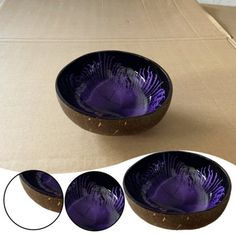 three purple bowls sitting on top of a cardboard box