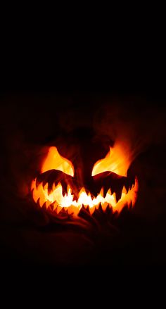 a pumpkin carved into the shape of a face