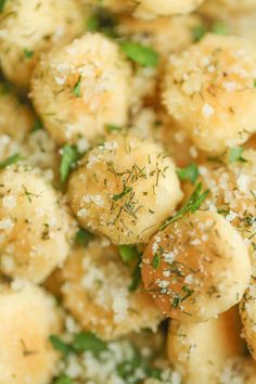 a close up view of some kind of food with herbs and seasoning on it