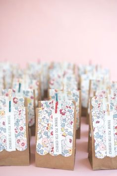 small brown paper bags with flowers on them