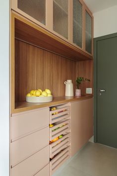 the kitchen is clean and ready to be used as a storage area for lemons