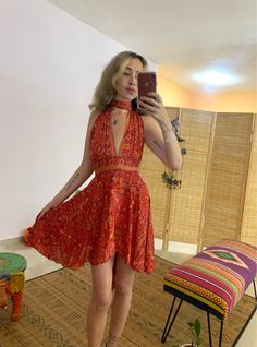 this silky bohemian dress is so adjustable! you can tie it is many many ways and styles️ it's a one loss size, dress has an elastic waist and ties to fit your body 🌱 fabric is soper soft and light  good form xs-small l ️ model is 1.67 cm high  thanks  💜 Hippie Hoco Dresses, Flowy Bohemian Mini Boho Dress, Flowy Bohemian Mini Dress, Hippie Style Boho Print Mini Dress, Bohemian V-neck Mini Dress For Festivals, Hippie Boho Print Mini Dress, Beach Mini Backless Dress With Tie Back, Backless Mini Dress With Tie Back For Beach, Bohemian Backless Fitted Mini Dress