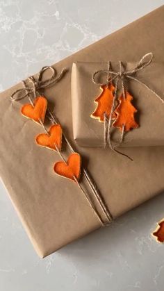 some brown paper with orange leaves on it