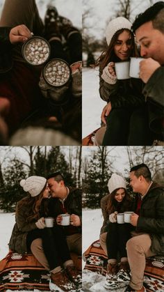 a man and woman sitting in the snow drinking coffee