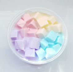 several different colored marshmallows in a bowl